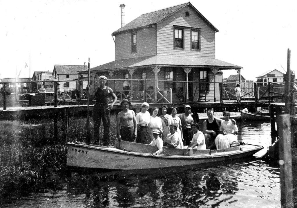  In the early 1900s, when this photo was taken, Broad Channel sported quite a few hotels, all on stilts and connected by boardwalks. The boat in the photograph, named Sonny, carries what are probably hotel guests on an outing in the water round the island. Guarino noted this is one of his favorite photographs because "that man standing on the prow looks an awful lot like Popeye."  Photo courtesy of Jean Bohne Ryan and the Broad Channel Historical Society.