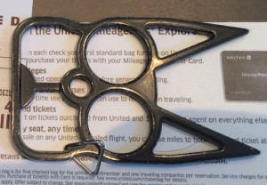 A Pennsylvania man was arrested and charged with carrying a loaded gun and a martial arts weapon, the cat-eye knuckles pictured here, at JFK International Airport last week, according the federal Transportation Security Administration. Photo courtesy the TSA