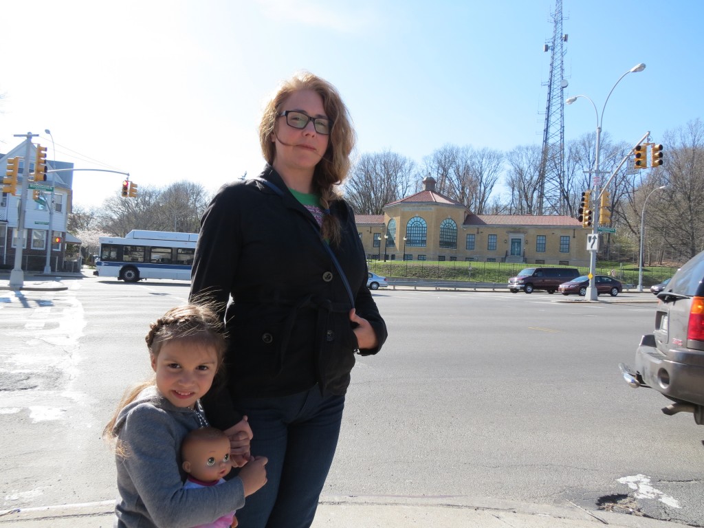  Lisa Meridew, who walks her daughter, Alice, to school almost every day, is urging the city to bring immediate relief to the intersection of Park Lane South and Woodhaven Boulevard, which she said is a disaster waiting to happen. Photo by Anna Gustafson