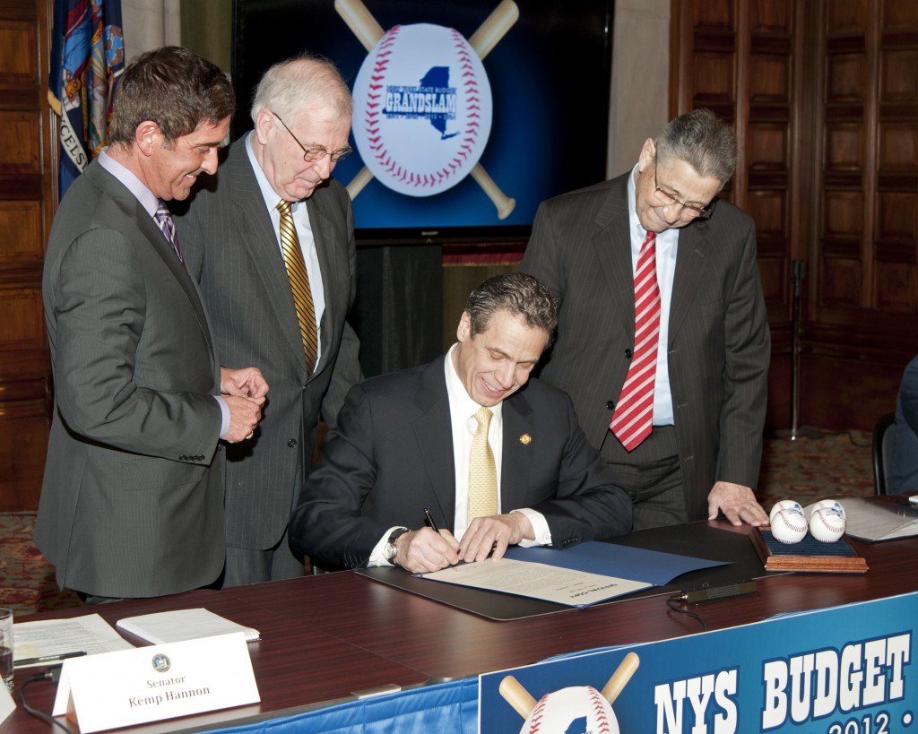 Gov. Cuomo, center, and state legislative leaders announce the passage of the 2014-15 budget this week. Photo courtesy Gov. Cuomo's Office