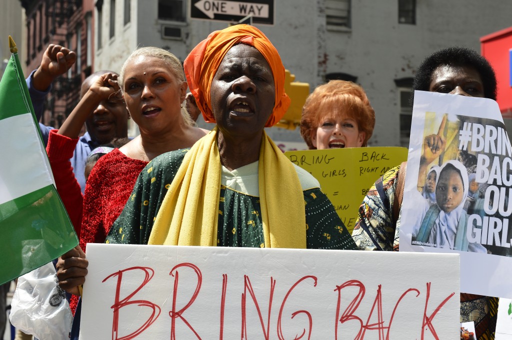 A large crowd of people, including Mayor Bill de Blasio and First Lady Chirlane McCray, rallied for the missing Nigerian schoolgirls outside the Consulate General of Nigeria in Manhattan on Saturday.  Photo by Diana Robinson/NYC Mayor's Office