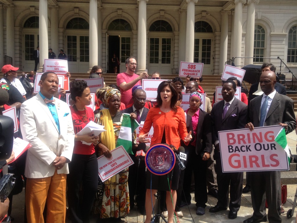Council Member Elizabeth Crowley, center, joined other legislators and advocates at a rally on the steps of City Hall to call for the safe return of hundreds of schoolgirls kidnapped in Nigeria.  Courtesy Council Member Elizabeth Crowley's office