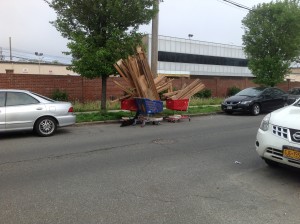 One neighbor said that because the spot "looks like a dump," that people treat it as such. Recently, this shopping cart filled with wood was left at the site.   Forum Photo