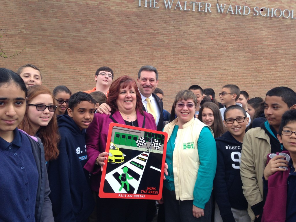 PS 232 students and educators, city officials, and state Sen. Joe Addabbo Jr. celebrated on Friday the DOT's implementation of two traffic signs near the Lindenwood school.  Photo courtesy NYS Senate 