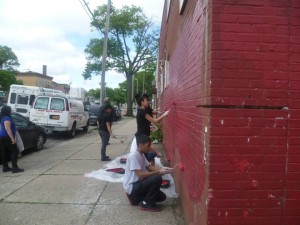 Volunteers worked hard to eradicate graffiti. Photo courtesy Richmond Hill Block Association