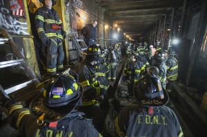 After an F train derailed near the 65th Street station in Woodside, emergency crews, including the FDNY, immediately responded to the scene. Photo by Patrick Cashin/MTA