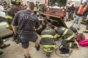 Firefighters help lead passengers out of the subway's underground via an emergency exit at 60th Street in Woodside. Photo by Patrick Cashin/MTA