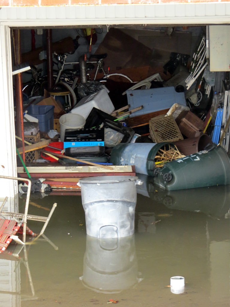 When residents assessed the damage in their homes following the storm, many were faced with destroyed garages and basements. Photo by Robert Stridiron