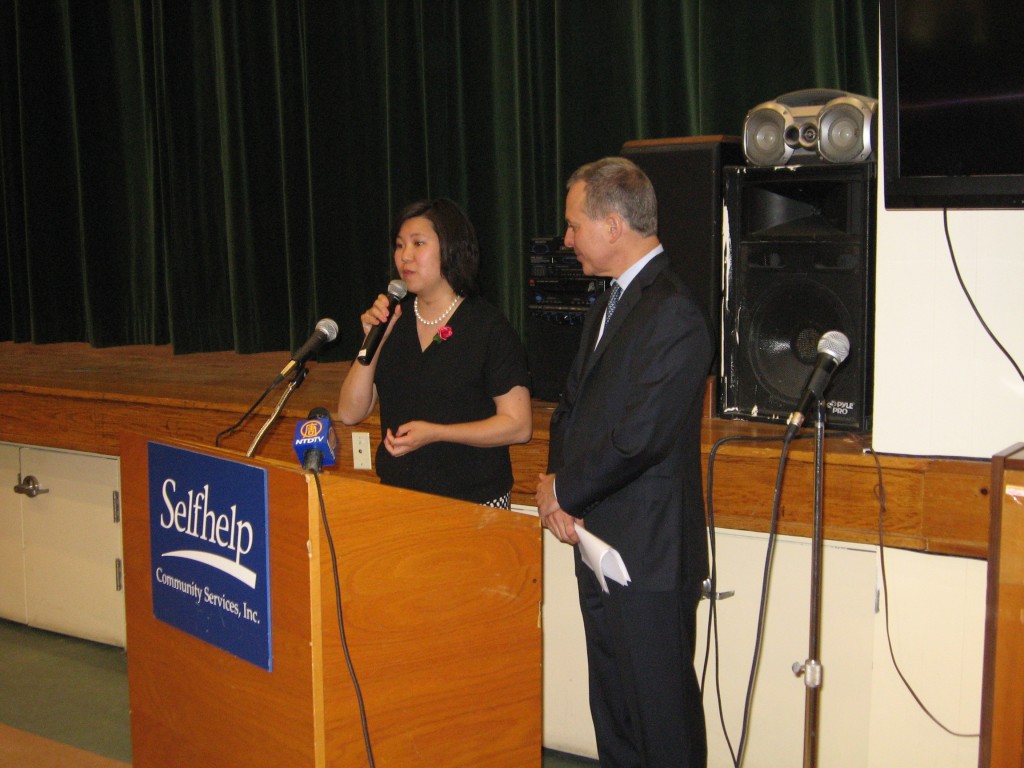 U.S. Rep. Grace Meng, left, and state Attorney General Eric Schneiderman address more than 100 seniors attending a forum on fraud and abuse last week.  Photo courtesy U.S. Rep. Grace Meng's office