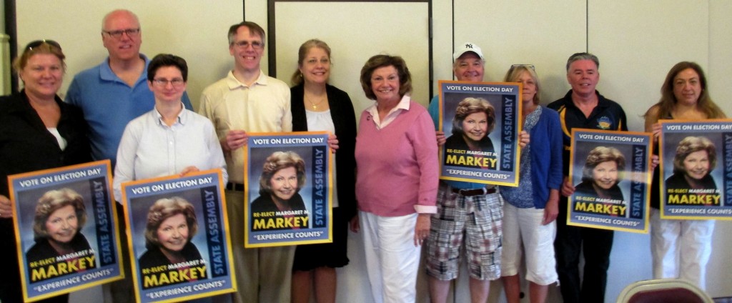 Assemblyman Marge Markey, center, kicks off her reelection bid with supporters, including U.S. Rep. Joe Crowley, second from left, at the end of May.  Photo by Phil Corso