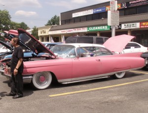Owner Sal Dipietro stands proudly next to his pink 1960 Cadilliac Coupe de Ville at the car show.  Photos by Debbie Cohen