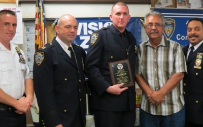 Top cop honored at 106th Precinct