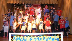 The Our Lady of Grace Youth Choir honors America at its weekend performance. Photos courtesy Steven Eriquez