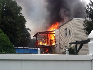  Flames rip through the backside of homes on 88th street in Woodhaven.  Photo courtesy Christine Ahlbrand