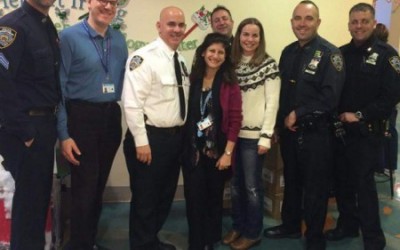 102nd Precinct Members Donate Money, Gifts to Hospital