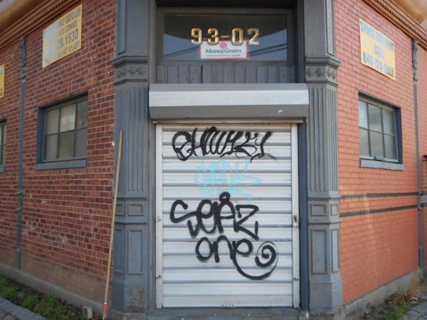 This storefront on 93rd street was vandalized by graffiti. Councilman Eric Ulrich (R-Ozone Park) worked to get $25,000 budgeted for graffiti removal. Photo Courtesy of Councilman Eric Ulrich's Office
