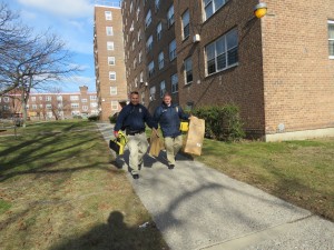 NYPD Crime Scene Unit detectives removed evidence from the building. Forum Photos by Robert Stridiron 