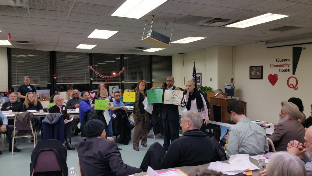 South Ozone Park residents continue their efforts to stop the construction of a juvenile detention center in their neighborhood, this time at CB 9's general meeting on Tuesday. Forum Photo by Michael V. Cusenza.