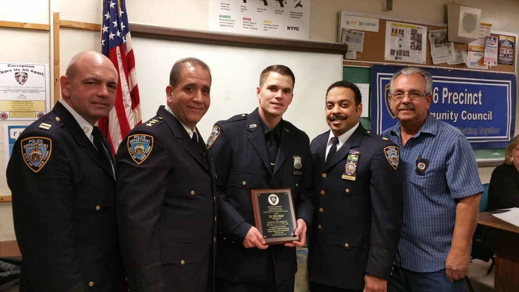 106th Precinct Cop of the Month Kyle Crean receives kudos on a job well done by Capt. John Gancey,106 executive officer (l. to r.); NYPD Chief of Patrol Carlos Gomez; Dep. Inspector Jeffrey Schiff, commanding officer of the 106; and Precinct Community Council President Frank Dardani. Forum Photo by Michael V. Cusenza.