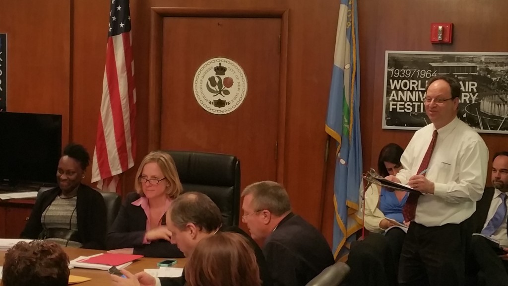 Deputy Borough President Barry Grodenchik (r.) tallies the votes on Monday evening at the Borough Board meeting. Forum Photo by Michael V. Cusenza.