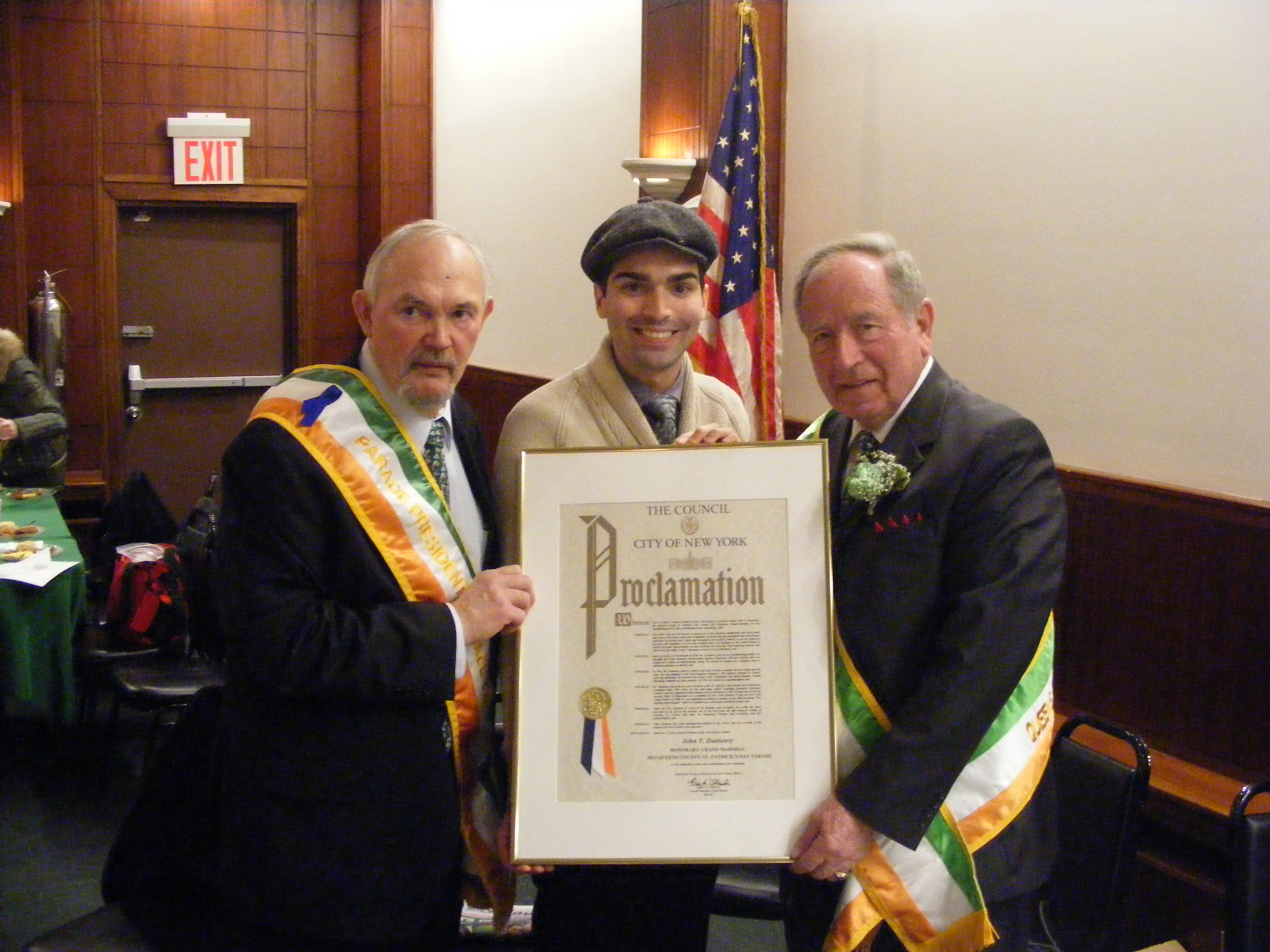 City Councilman Eric Ulrich (R-Ozone Park) last weekend presented Mike Benn (l.), president of the Queens County St. Patrick's Day Parade Committee, and Honorary Grand Marshal John Dunleavy, with Council Proclamations at the Knights of Columbus in Rockaway.  Photo Courtesy of Councilman Ulrich's Office.