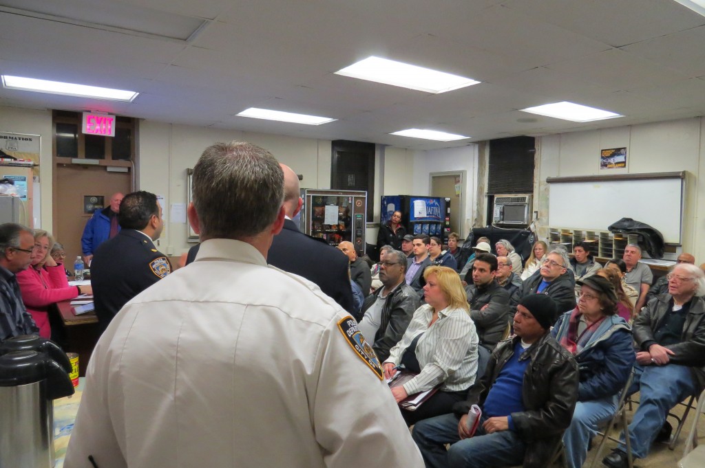 Deputy Inspector Schiff gave a breakdown of crime statistics for the month, focusing on tips to prevent the various forums of identity theft that have contributed heavily to a 71% escalation in the total of grand larceny incidents within the confines of the 106. Forum photo by Patricia Adams.