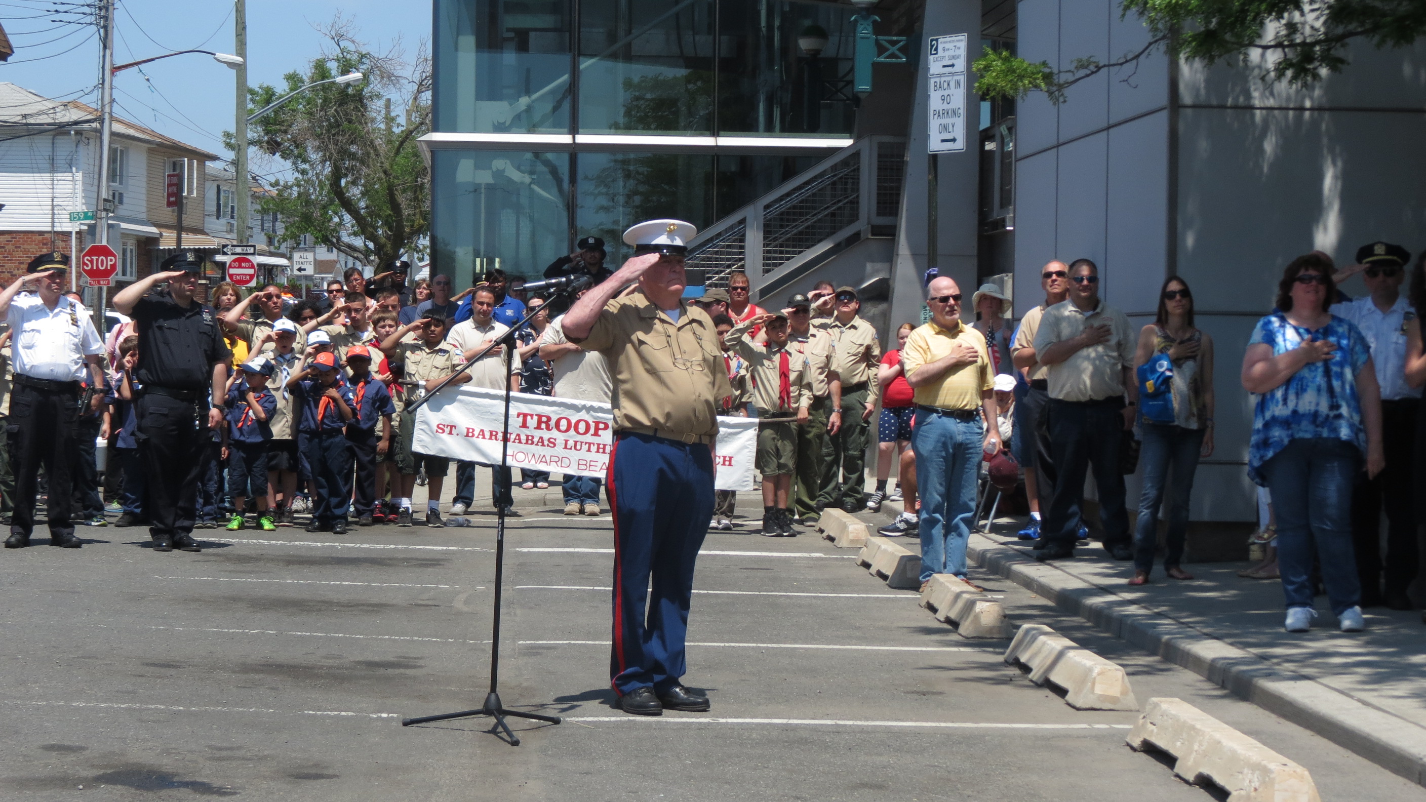 VFW Bernard J. Coleman Post 2565 Commander Pat Connolly salutes those who have made the ultimate sacrifice. Forum Photos by Patricia Adams and Michael V. Cusenza.