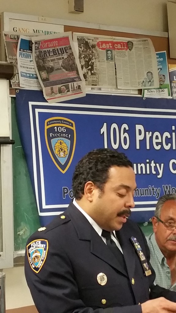 Deputy Inspector Jeff Schiff on Wednesday addressing the meeting of the 106th Precinct Community Council.  Forum Photo by Michael V. Cusenza.
