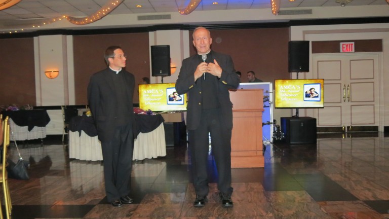 Msgr. Rucando Passes Shepherd’s Staff to New OLG Pastor, Fr. Marc Swartvagher