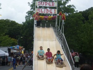 Children of all ages made the exciting Super Slide a popular attraction last Saturday.