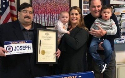 Miller Presents Constituent with Personalized Down Syndrome License Plate
