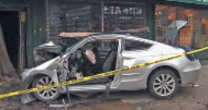 Three Hurt as Car Slams into Furniture Store