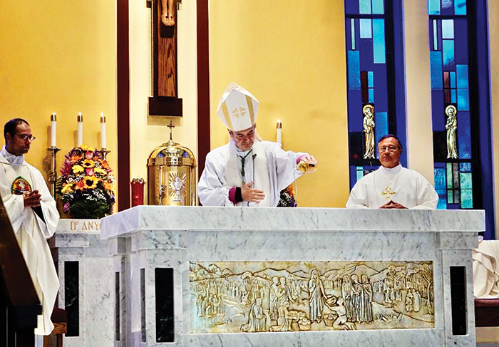 Photo Courtesy of Diocese of Brooklyn Bishop Brennan consecrates St. Thomas More’s new altar.