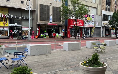 DOT Brings Street Seats to Jamaica Avenue,  Begins Bike Lane Hardening on Queens Boulevard