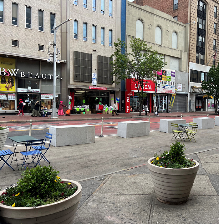 DOT Brings Street Seats to Jamaica Avenue,  Begins Bike Lane Hardening on Queens Boulevard