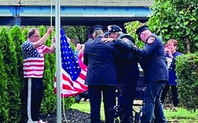 Retired City Firefighter Leads Community in Emotional Sept. 11 Memorial Ceremony