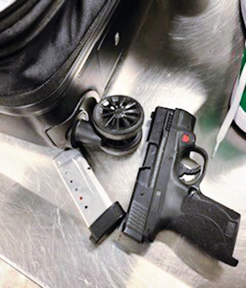 Photo Courtesy of TSA Last week, this gun and loaded magazine were removed from a pair of sneakers packed in a checked bag at LaGuardia Airport.