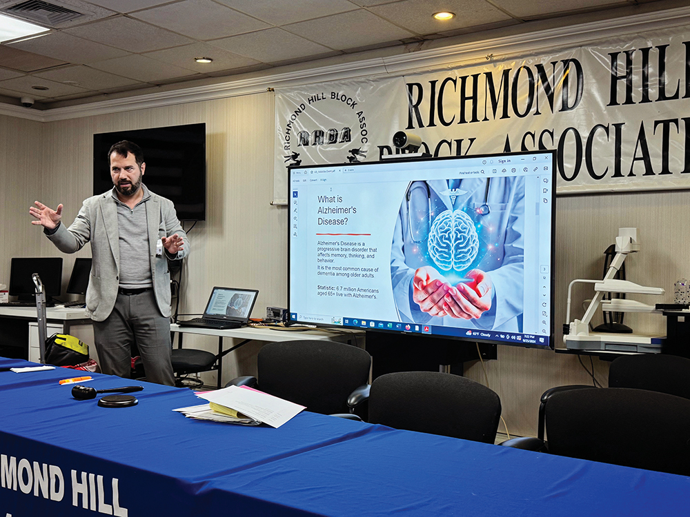 Photo Courtesy of Sen. Addabbo Stefany Martinez of the Alzheimer’s Association conducts a demonstration with some volunteers to help participants get a better understanding of how the disease impacts daily life.