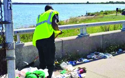 Group Keeps Bridge  Area Clean