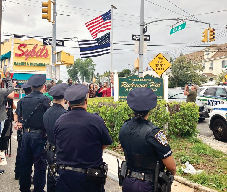 Richmond Hill Raises Flag for Fallen Cop